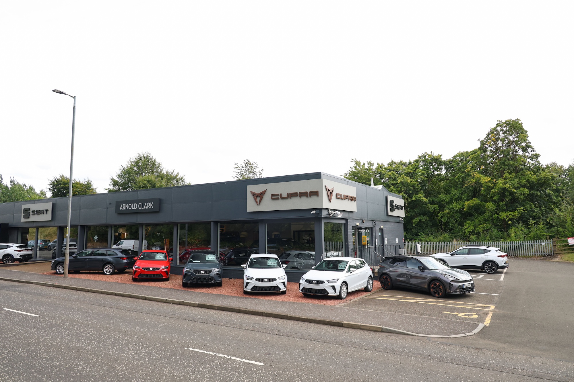 What does Arnold Clark’s takeover of the 65‑year‑old W Livingstone SEAT/CUPRA dealer mean for customers?