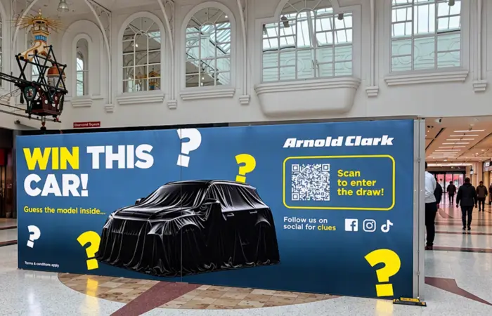 Arnold Clark Motorstore Telford showroom with promotional signage
