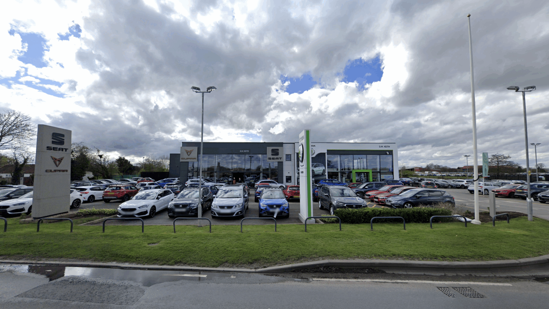 showroom displaying new and used vehicles at D.M. Keith dealership