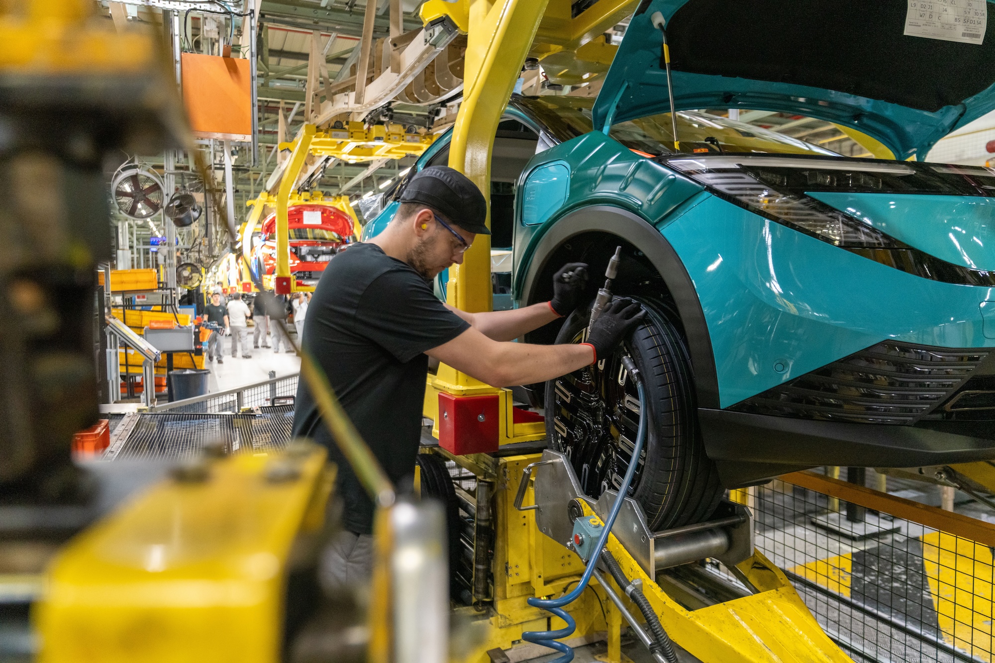 What does the £130m government funding boost mean for the UK automotive sector?