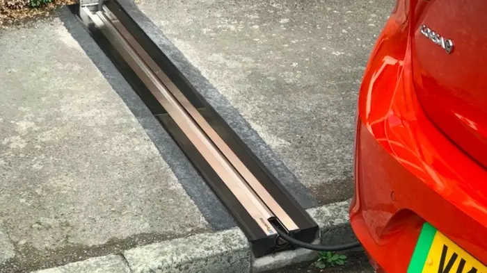 EV charger installed on a public street curb in England