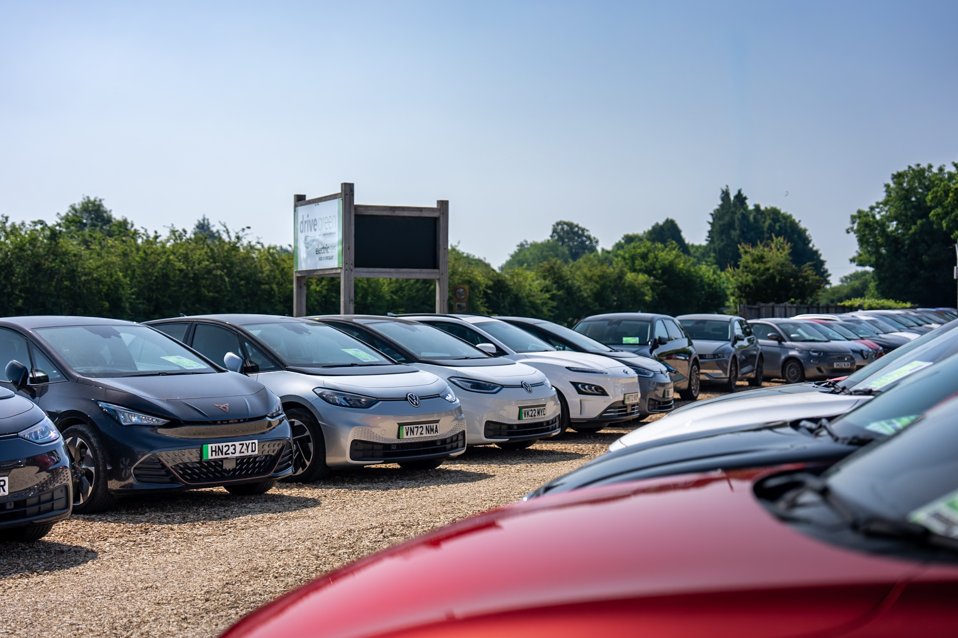Independent car dealer showroom displaying electric vehicles