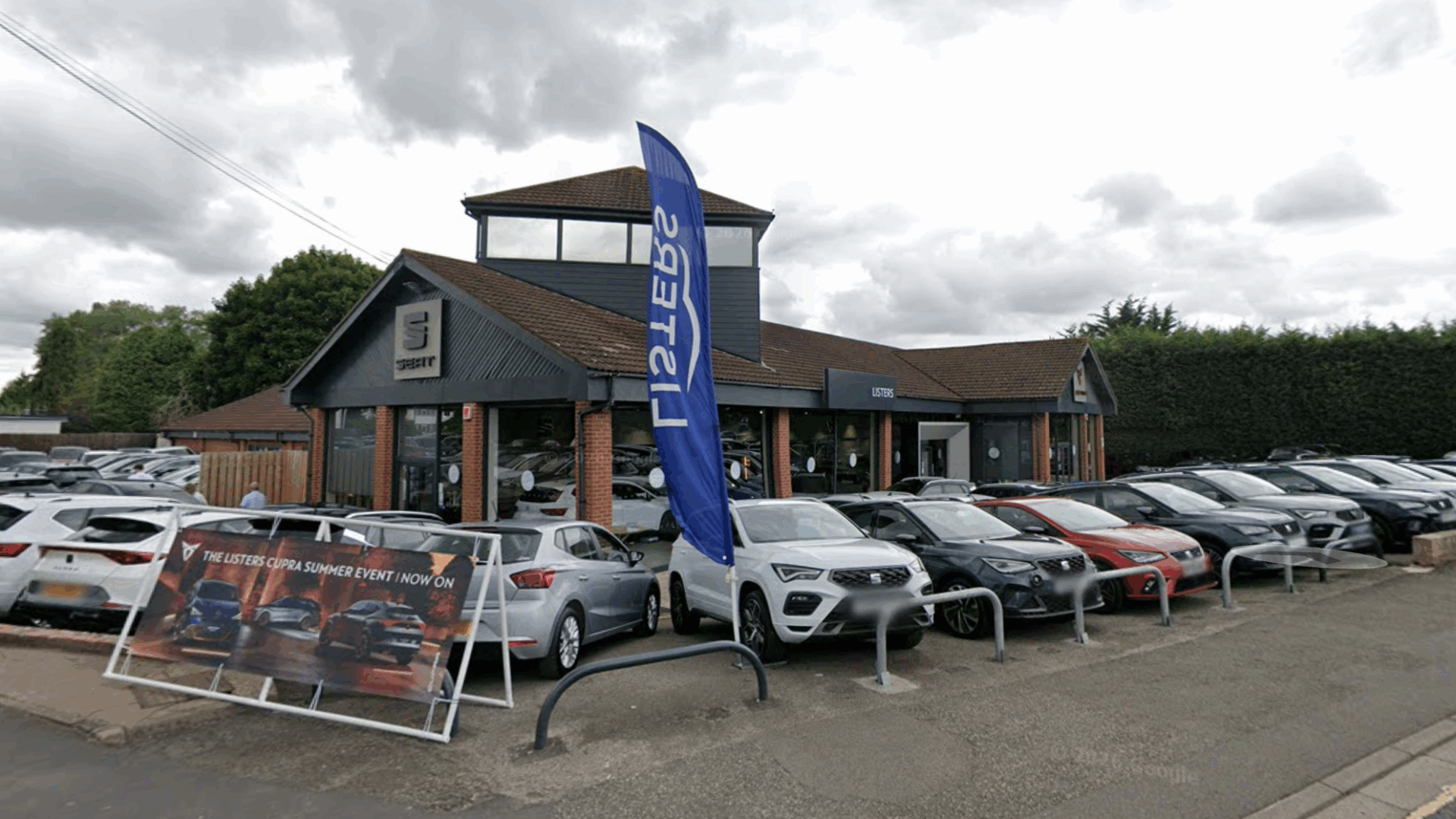 Why did Listers Group profits fall 15% after moving to agency agreements?