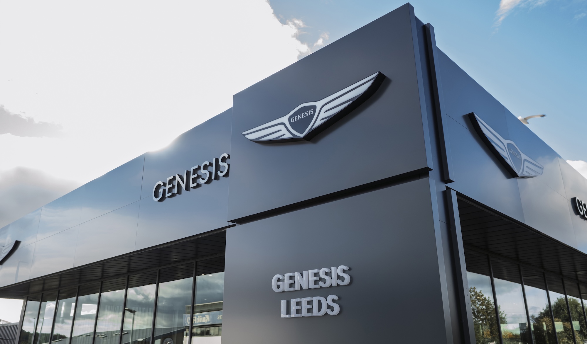Glass‑fronted Genesis Leeds showroom on Gelderd Road