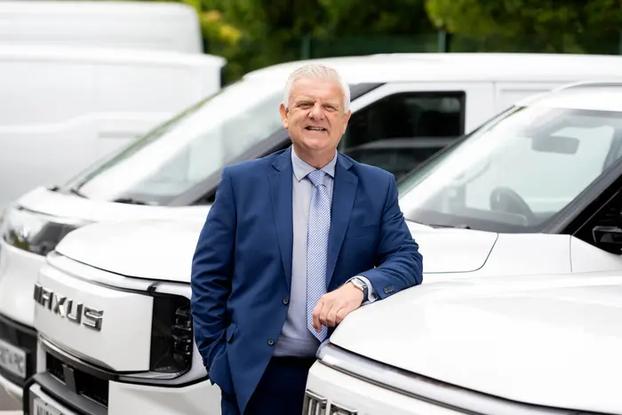 maxus van dealership with branding and staff