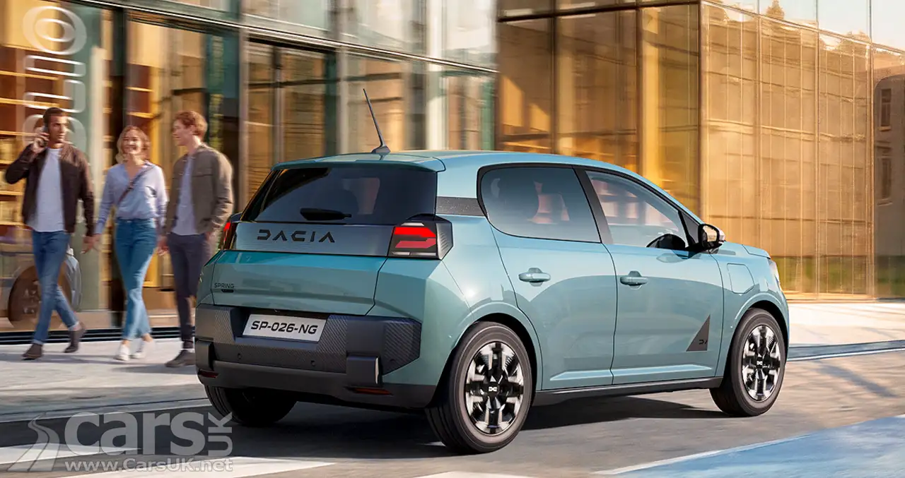 Dacia Spring charging plug connected to a public charger