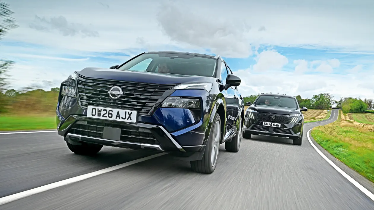 Peugeot 5008 exterior showing hybrid badging