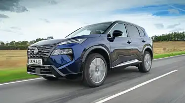 Nissan X‑Trail exterior with hybrid badge