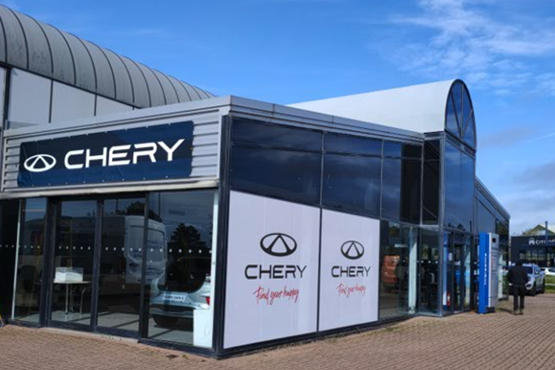 showroom frontage displaying multiple brand logos after expansion