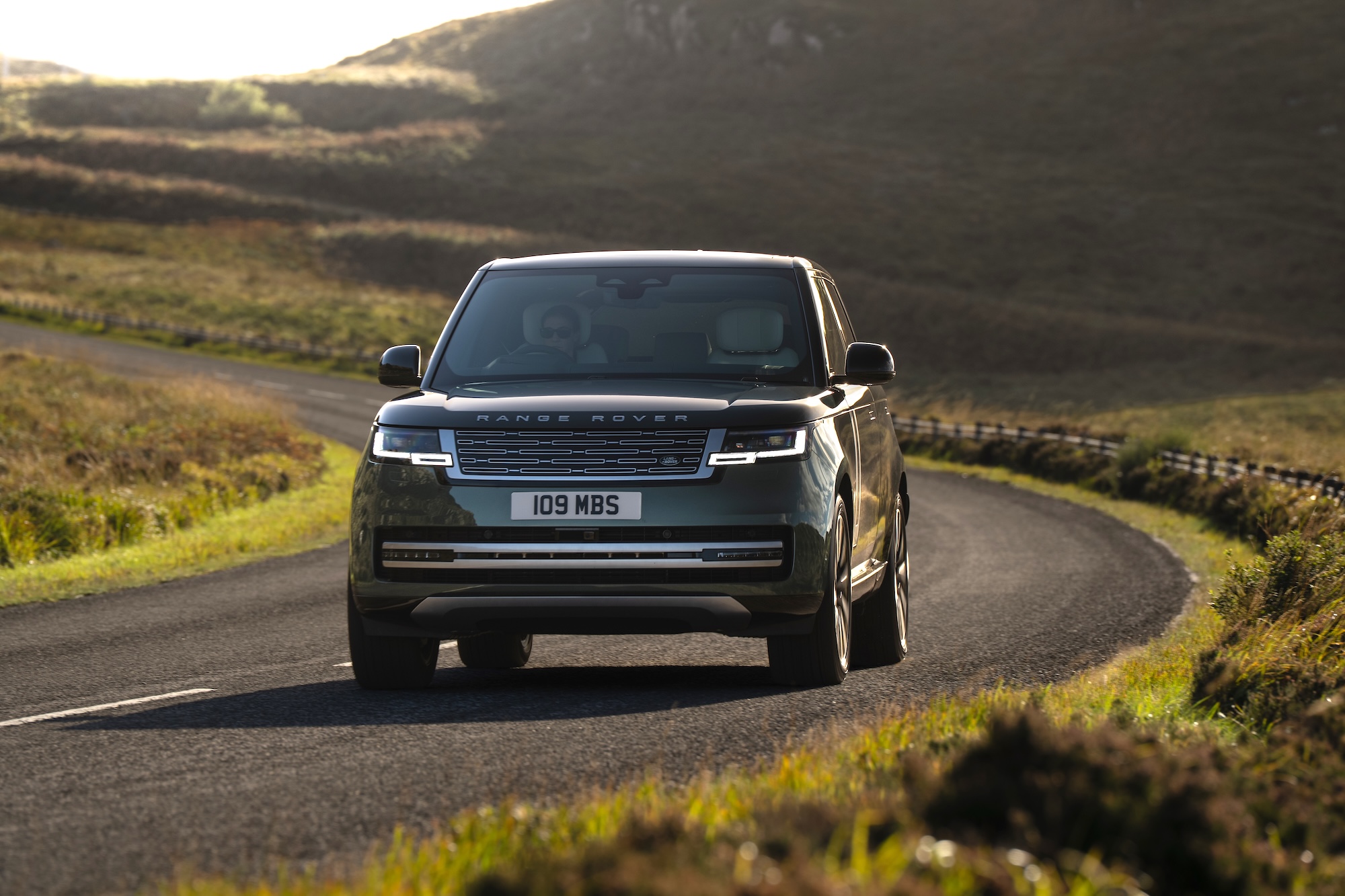 Range Rover Electric concept displayed on showroom floor