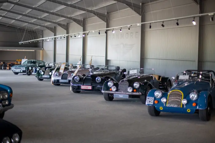 converted agricultural building now serving as a Morgan showroom by Ranmore Fine Motor Cars