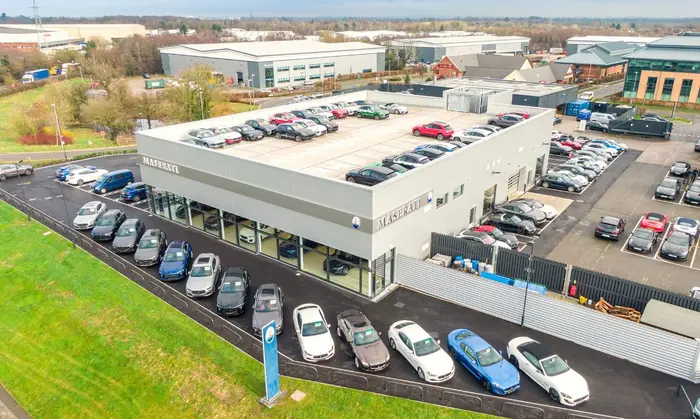 Sytner Group showroom with new vehicles on display
