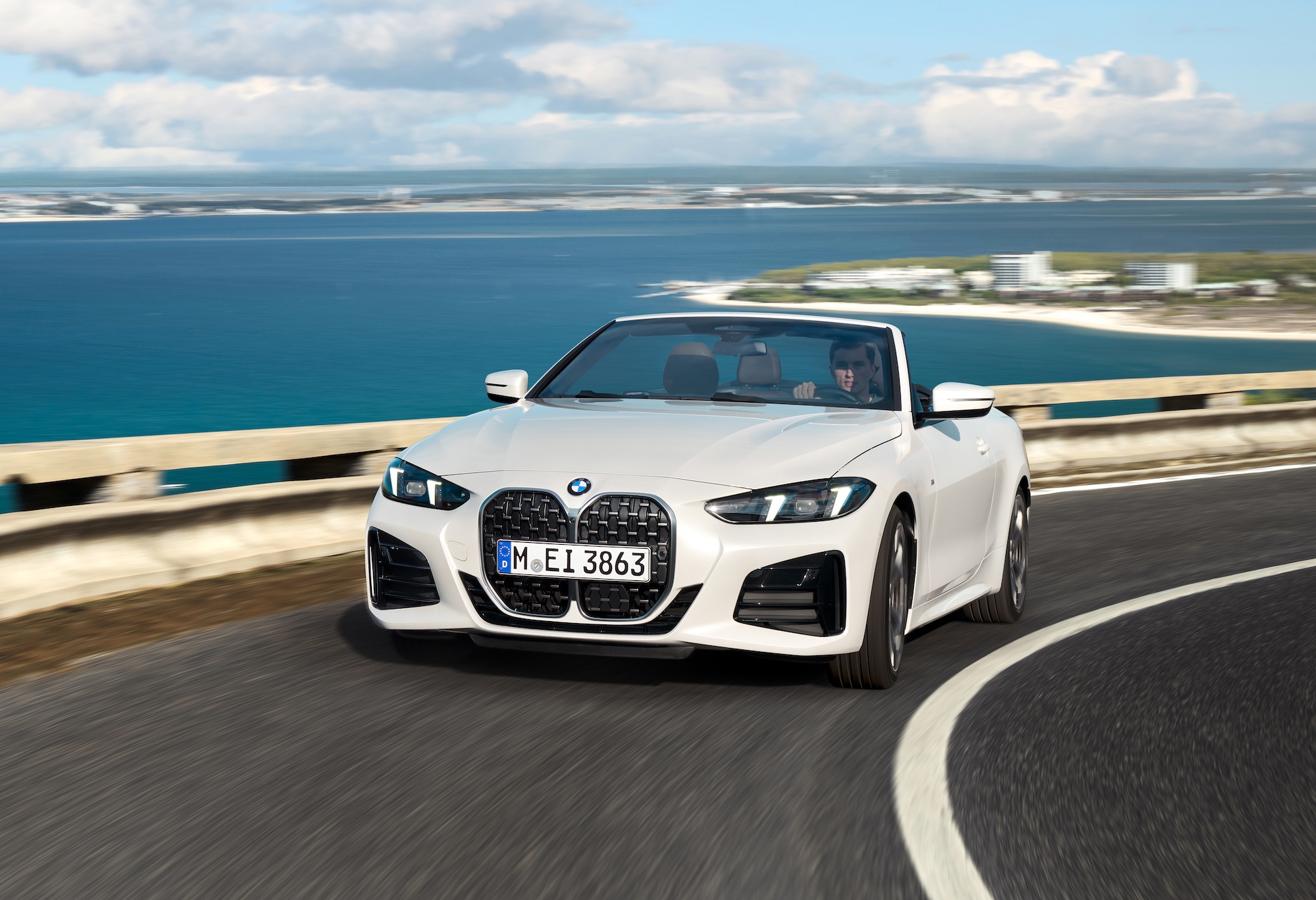 BMW 4 Series convertible parked at a dealership