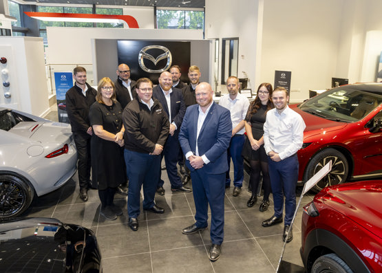 Dual‑brand Sheffield showroom displaying Mazda and Nissan vehicles