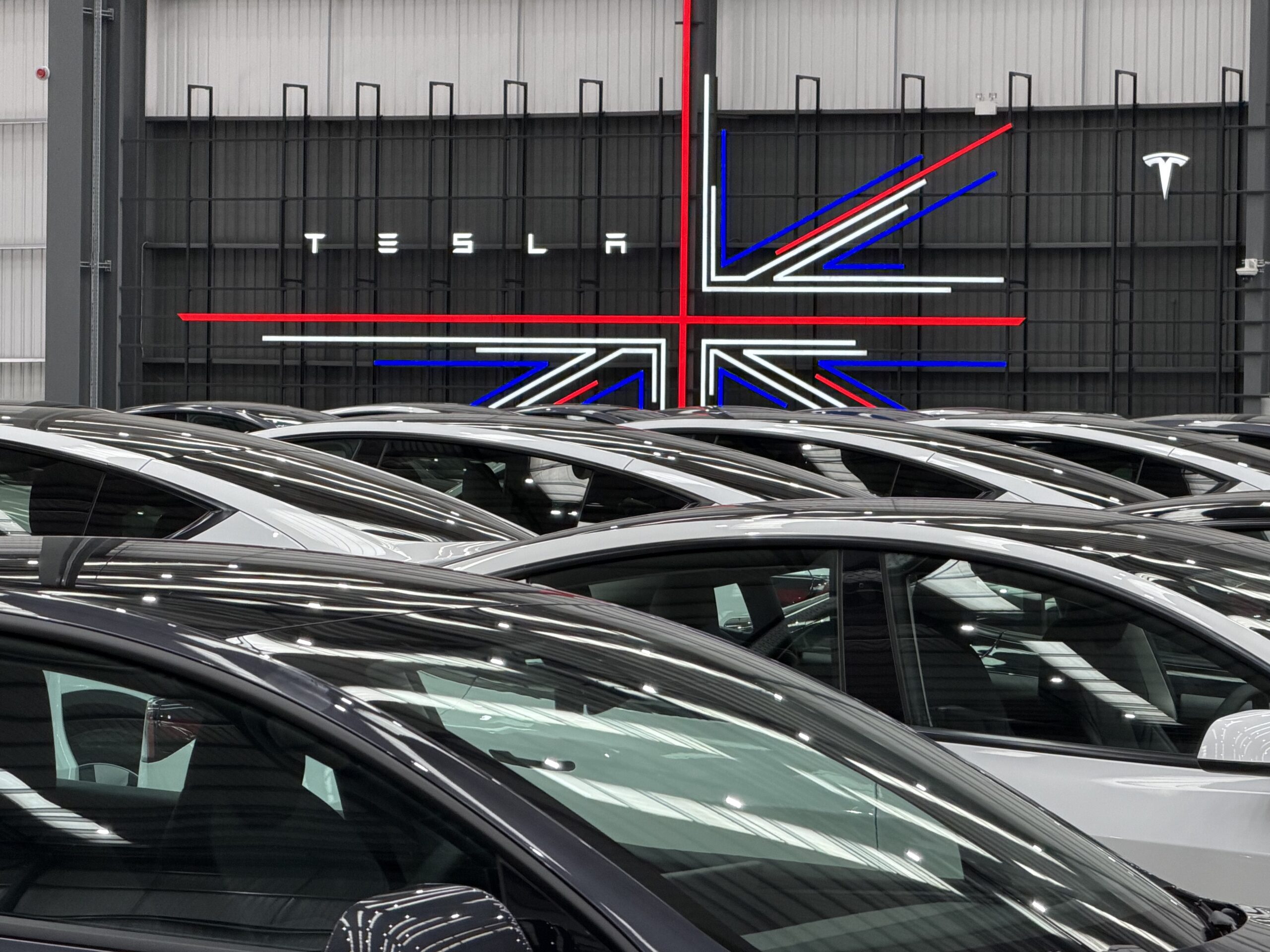 What does Tesla’s UK used‑car operation look like and why are dealers keen?